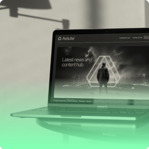 a square image of astute's website displayed on a laptop computer