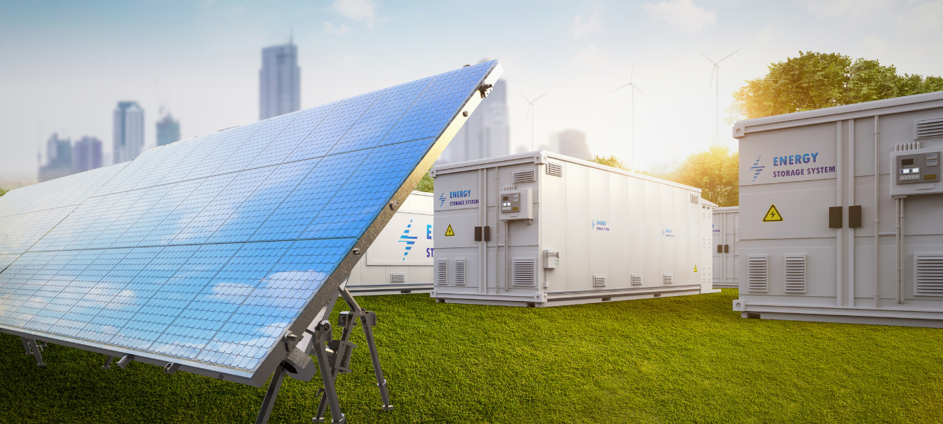 Solar and battery storage against a skyline